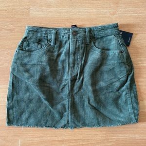 Green corduroy mini skirt